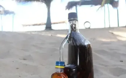 Bottle of Honduran gifiti with herbs and Garifuna tradition