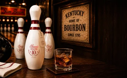 Bourbon barrels in a Kentucky distillery associated with Jim Beam