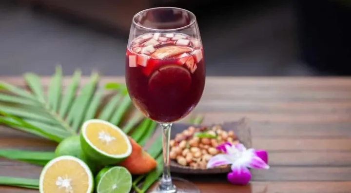 Glass of Spanish sangria with fruit, a classic summer drink