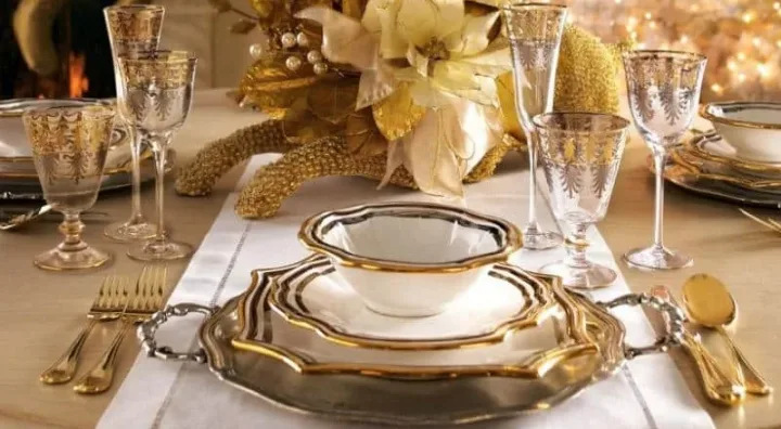 Formal table setting with plates, cutlery, glasses and napkin